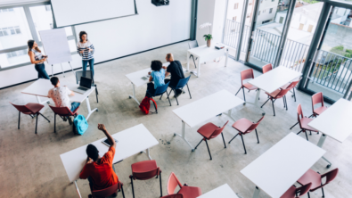 Students in a classroom with instructors