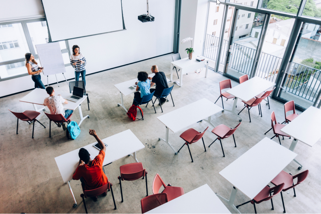 Students in a classroom with instructors