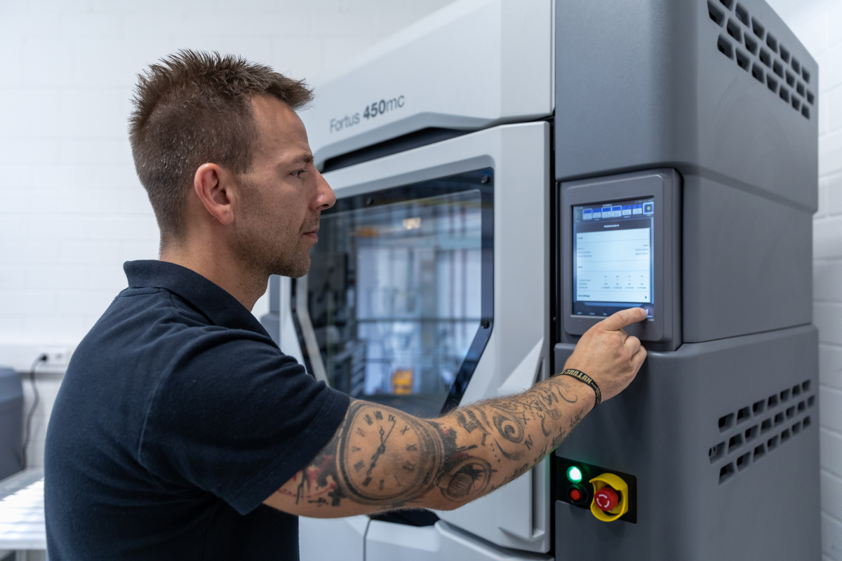 Machine shop programmer uses machine to program tool paths.