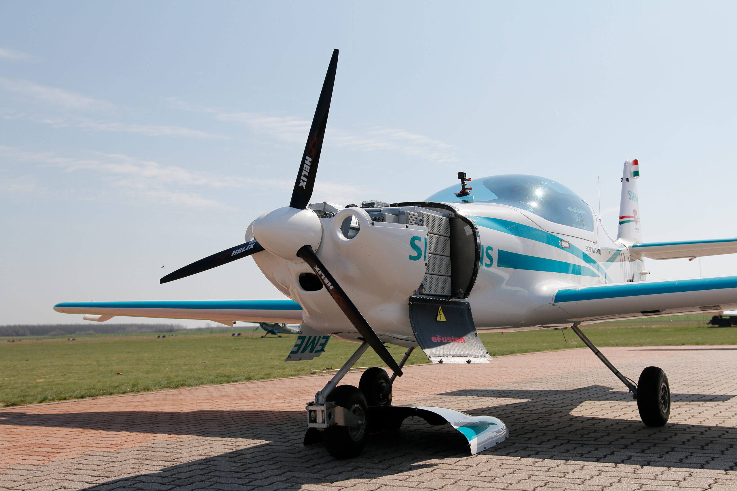 Electric aircraft sitting on the tarmac for inspection