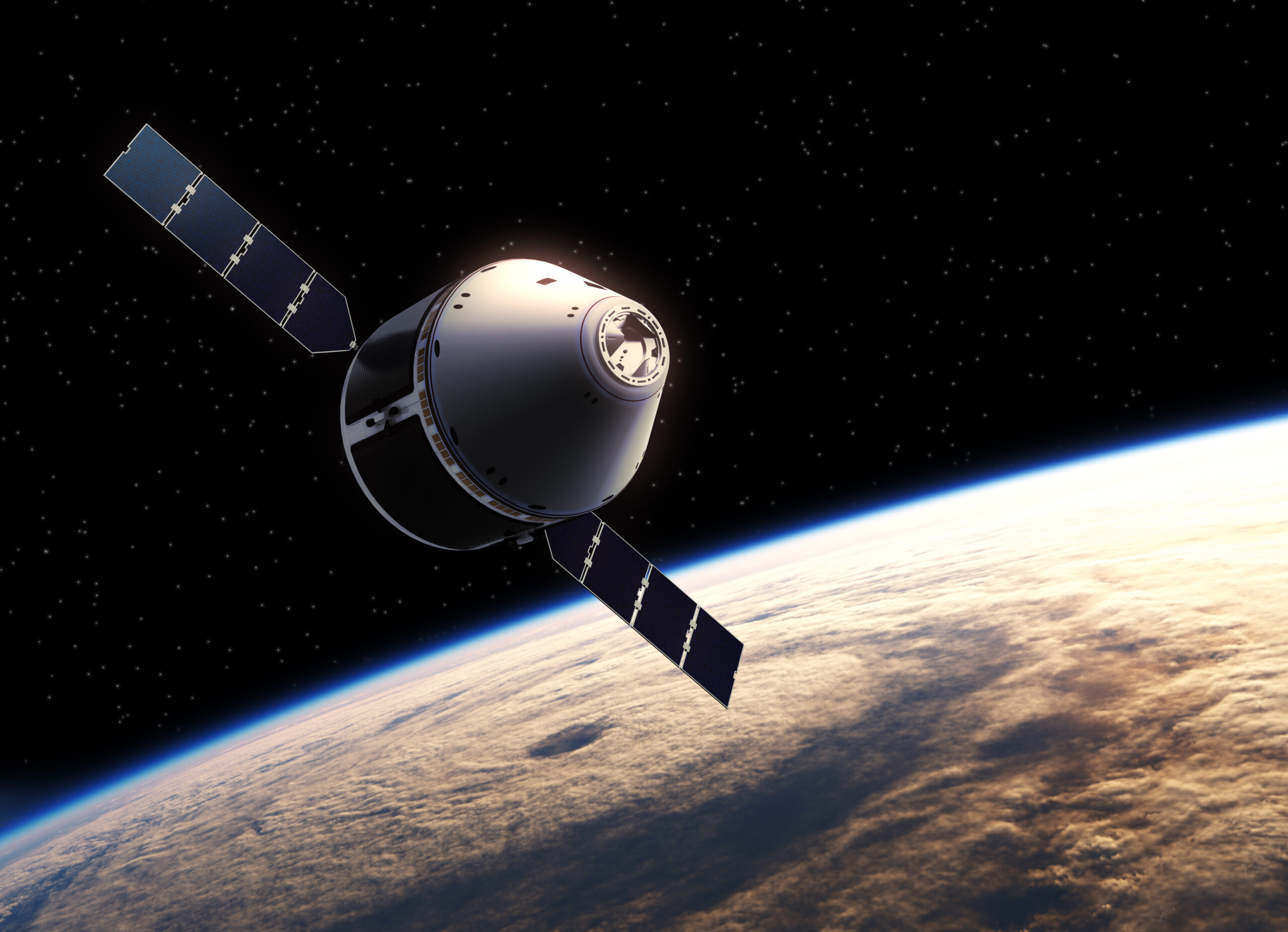 Spacecraft flying over Earth, above storm clouds.