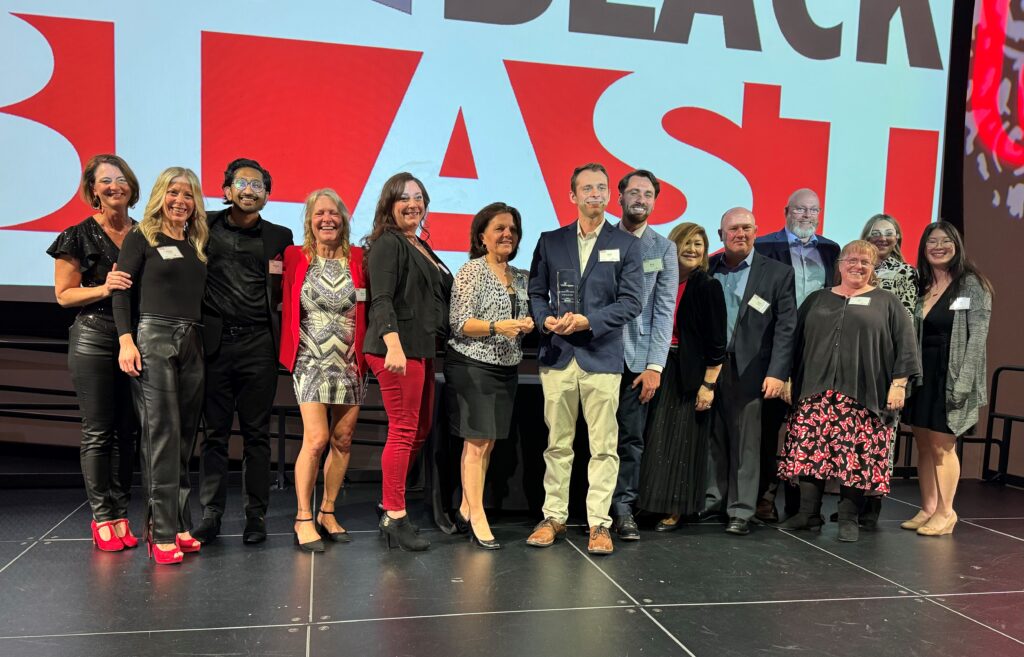 A group of Siemens and University of Cincinnati employees honoring the Employment Partner of the Year award to Siemens.