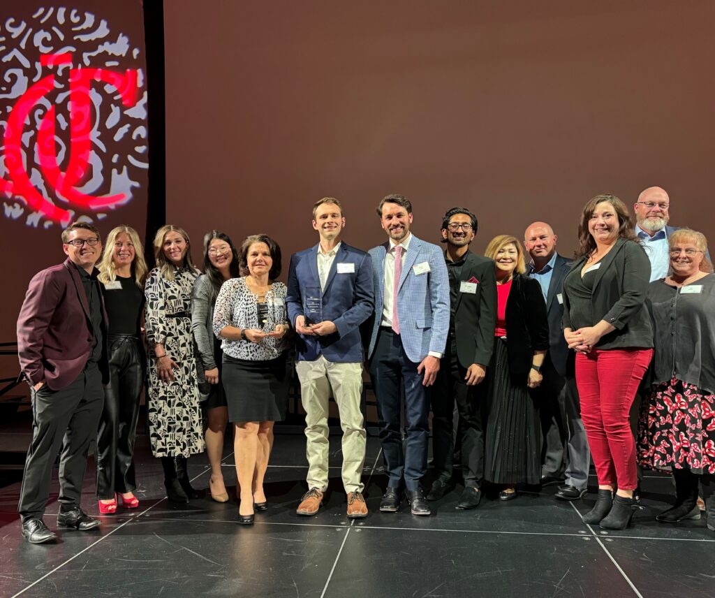A group of Siemens and University of Cincinnati employees honoring the Employment Partner of the Year award to Siemens.