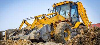 Image of a heavy equipment bulldozer at a worksite