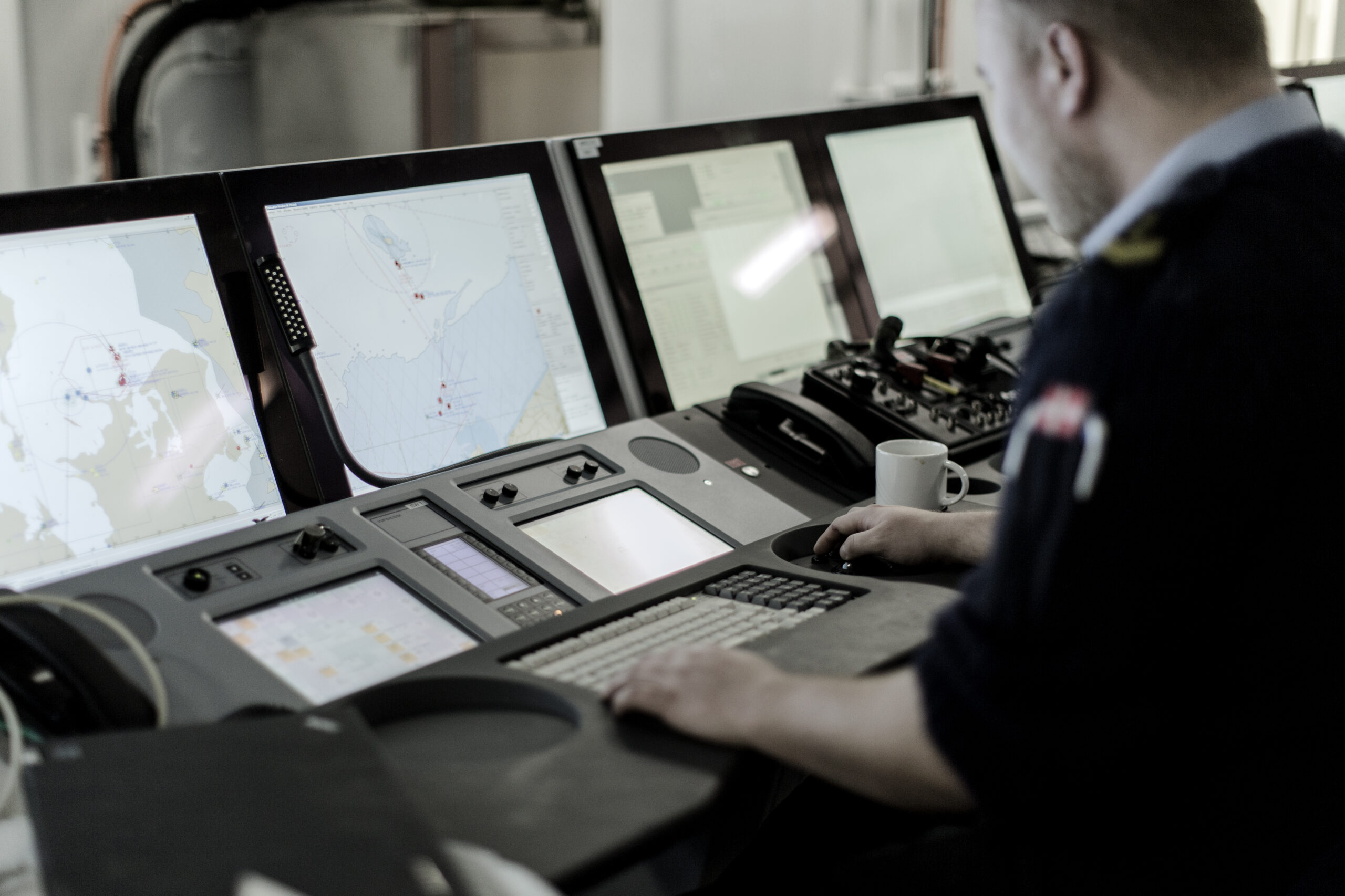 a man at a set of monitors