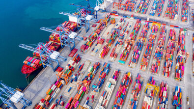 Top view of Deep water port with cargo ship and containers. It is an import and export cargo port where is a part of shipping dock and export products worldwide