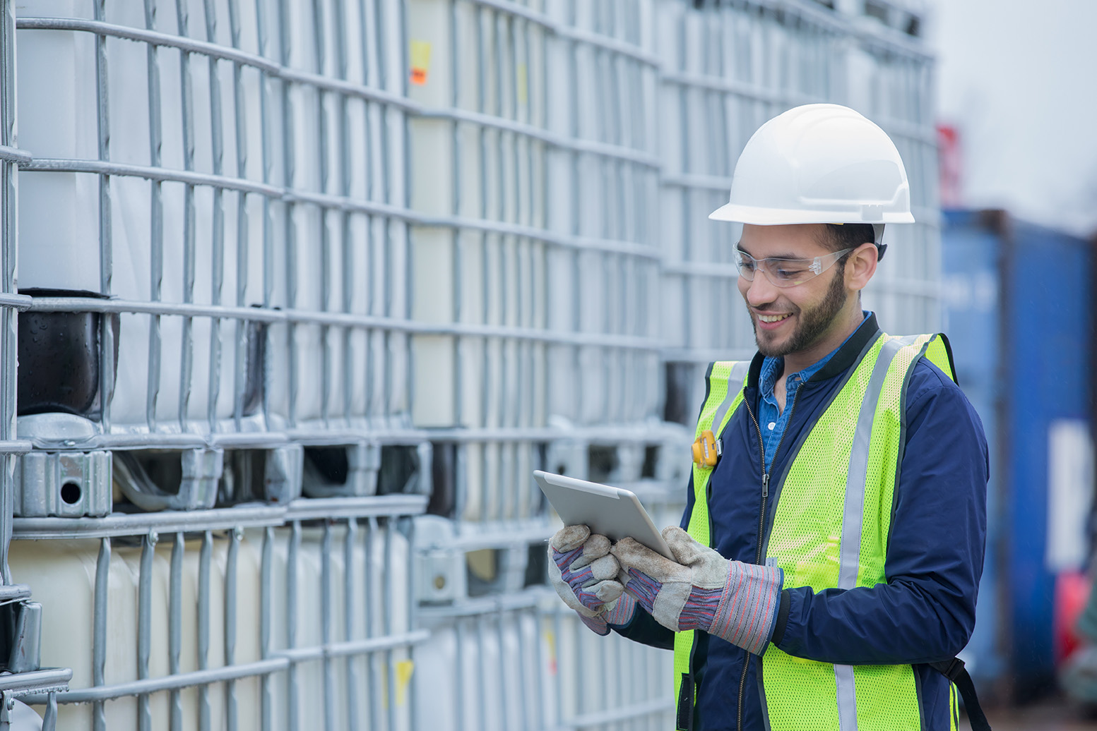 Field engineer using an iPad to inspect equipment.