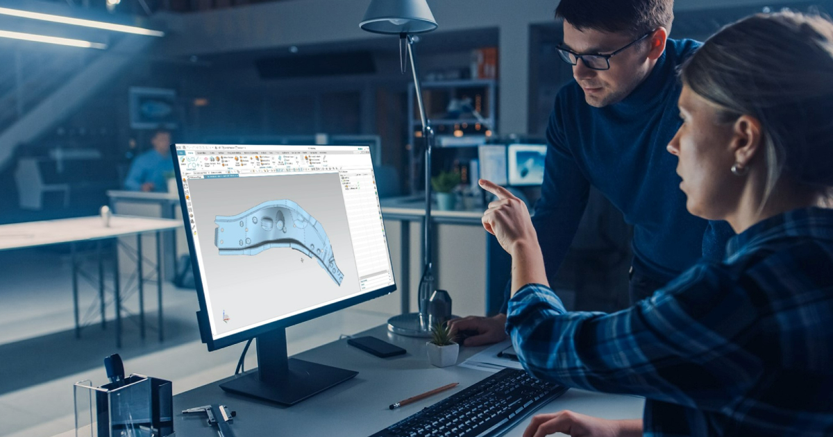 Man and woman looking at product CAD drawing on screen