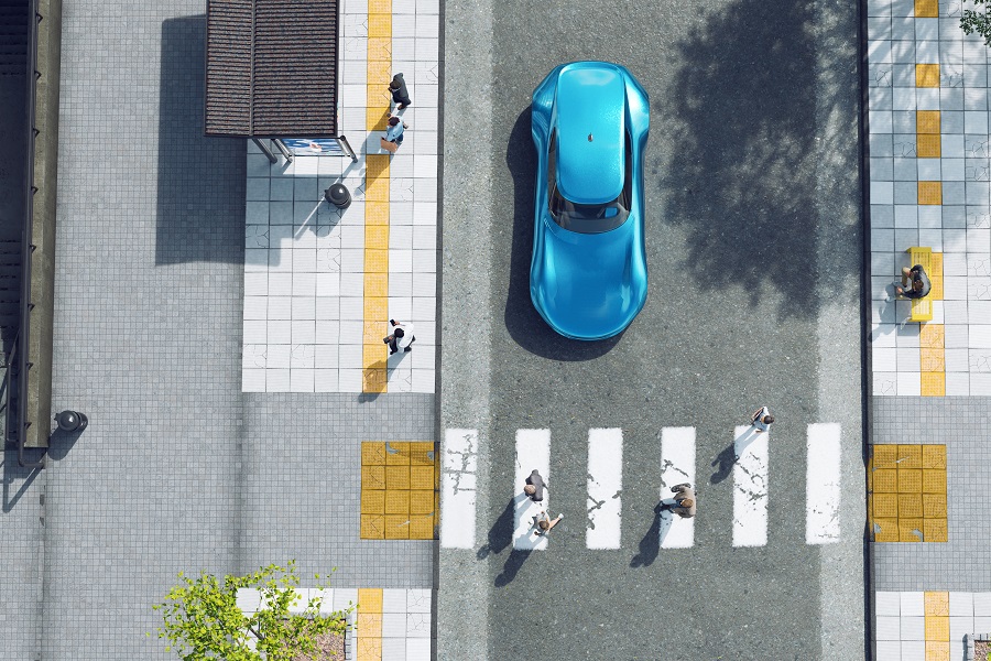 Daily life in a city with people walking across a street at a zebra crossing. A generic electric car has stopped before the people. It could be a driverless car using artificial intelligence to operate and detecting people on the street. Options for public transportation nearby: A busstop and a subway.