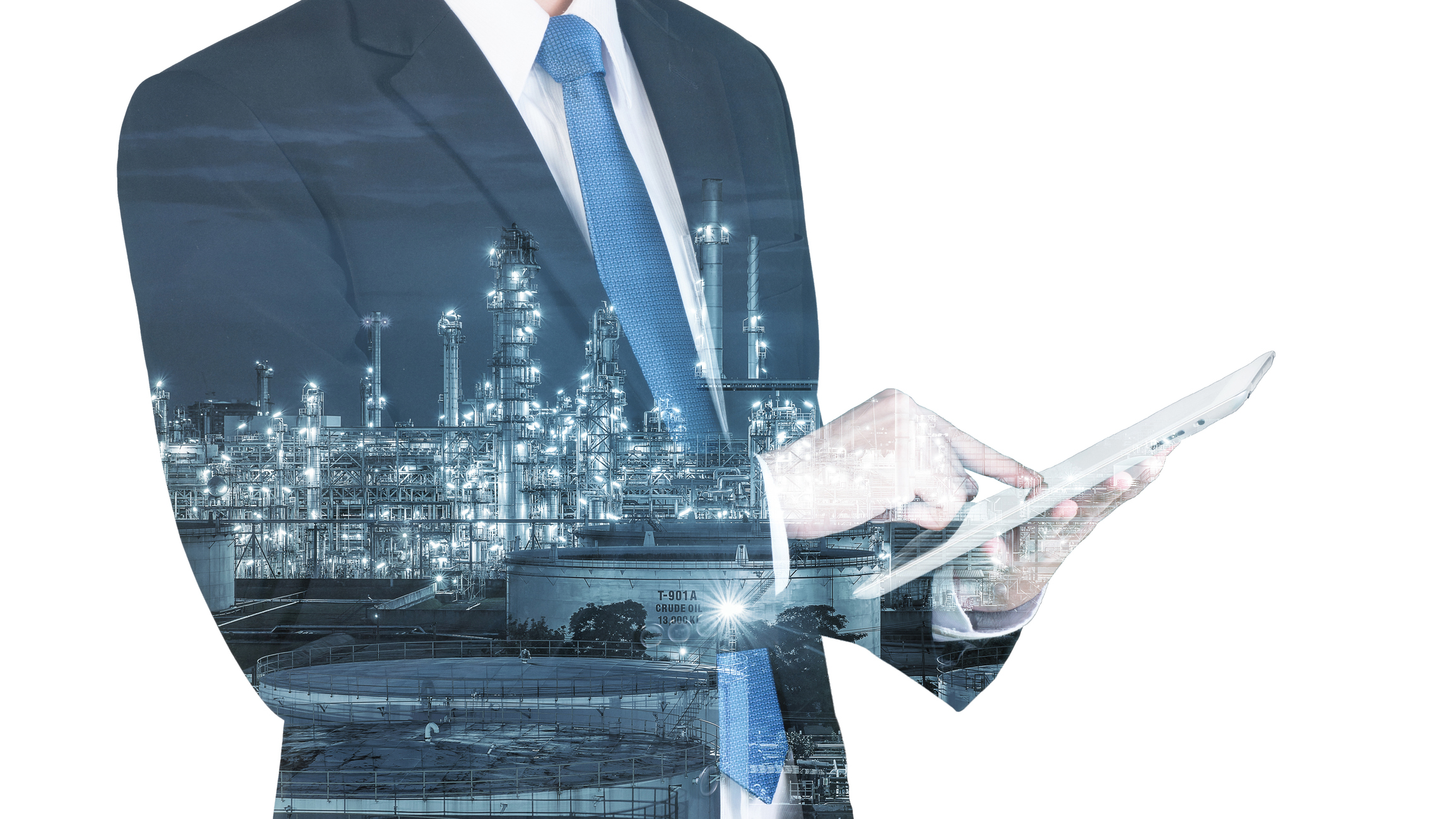 Double exposure of businessman with tablet in front of petrochemical factory