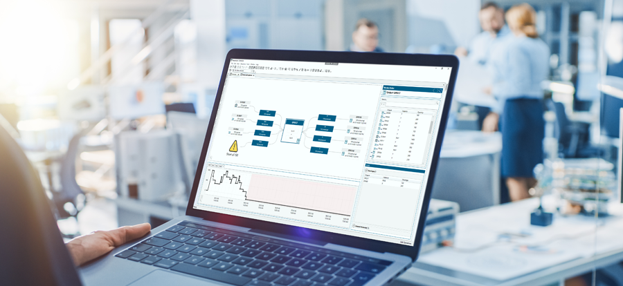 The image shows advanced planning and scheduling software open on a laptop