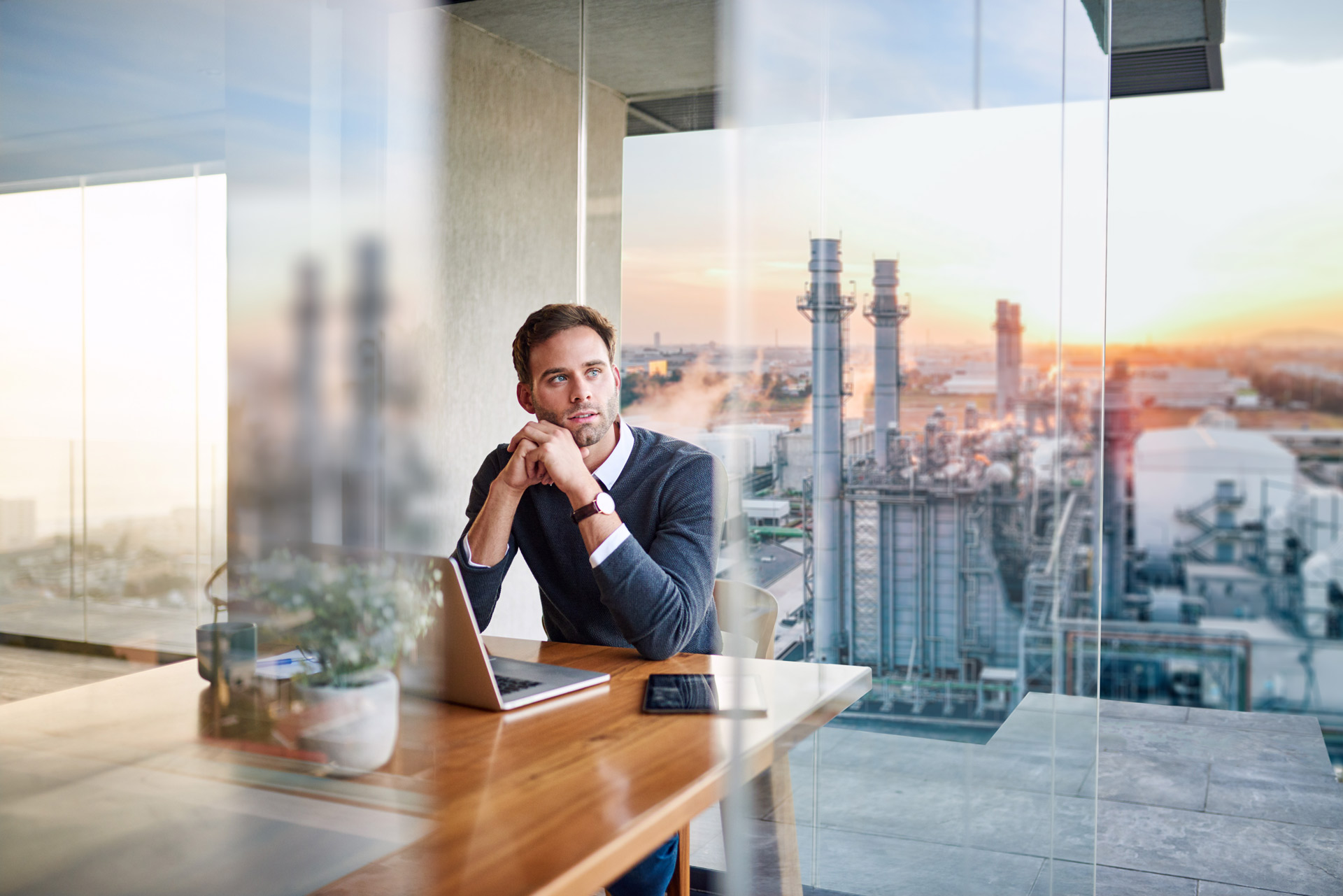 Integrated design for SMBs a man sitting at desk working on Solid Edge