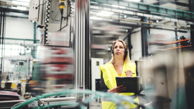 An industrial engineer working in a factory.