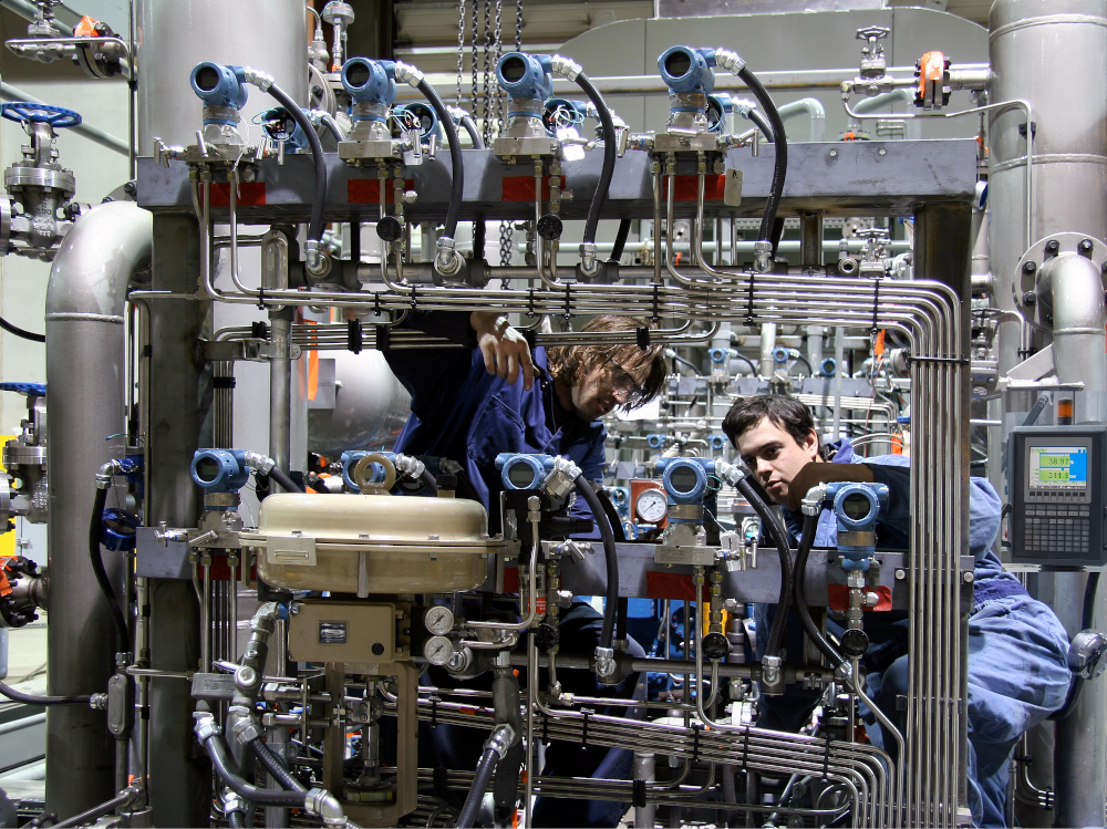 Engineers commissioning a machine