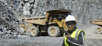 Female mine official supervises work