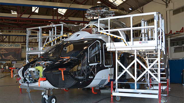 Pilot project of an helicopter in a hangar