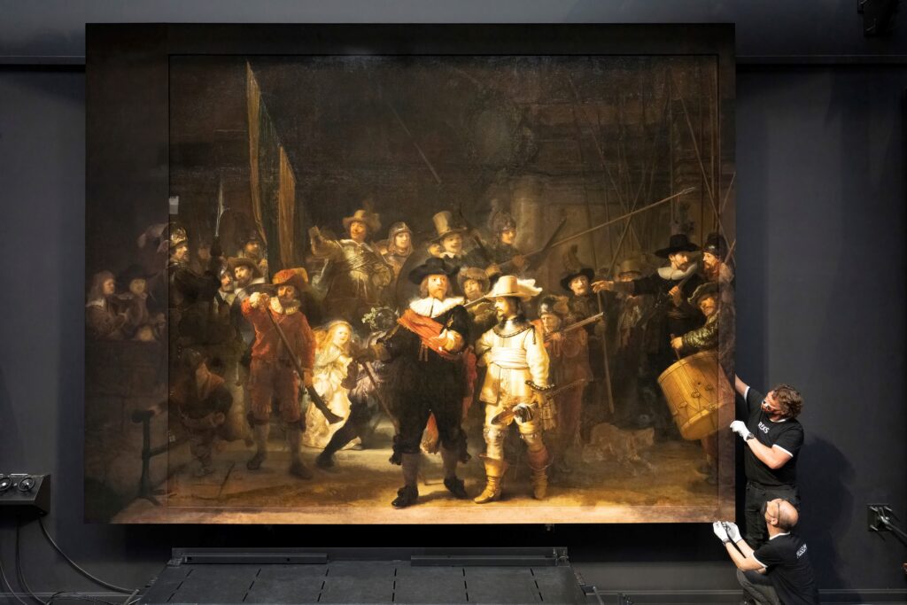 The Night Watch by Rembrandt with the digitally printed missing pieces was briefly displayed at the Rijksmuseum.