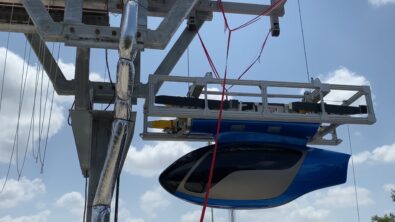 skyTran Pod being raised up to the track, in preparation for a test run