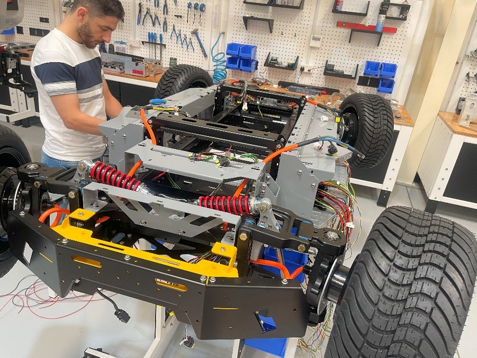 Engineer building an autonomous robot