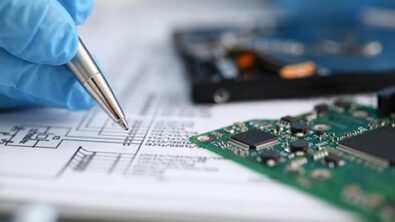 Test engineer performing design rule checks manually for 3D IC heterogenous designs