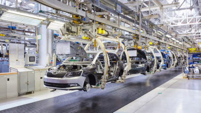 Cars are manufactured on a production line by robots